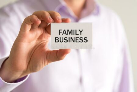 businessman-holding-card-text-family-business-closeup-businessman-holding-card-text-family-business-business-86583333 FAMILY BUSINESS