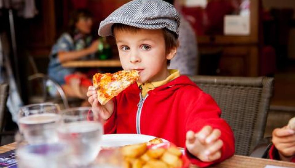 Pizza Restaurant with cute little boy